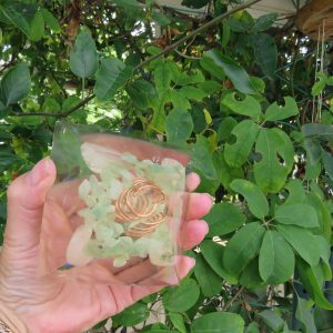Hand-held Crystal Resin Pyramid filled with Green Aventurine, Rose Quartz, Quartz Point & Copper Coil. L84