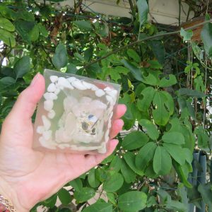 Hand-held Resin pyramid filled with Rose Quartz, Quartz Granite, Brass Cog, Green Colour Wash. (ref L85)